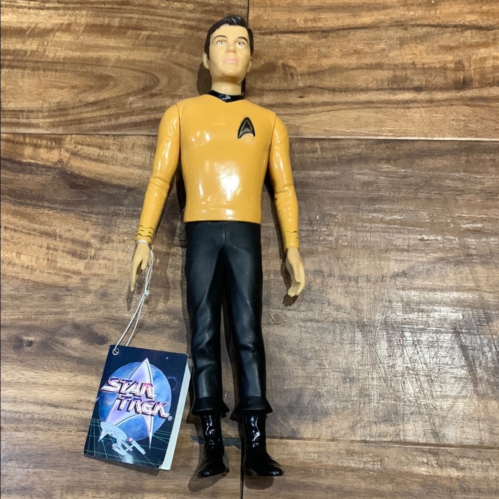 Action Figure - Yellow and Black. James Kirk. Star Trek